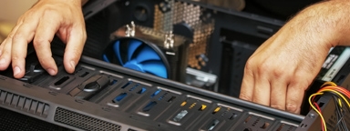Hands inside of an open PC case